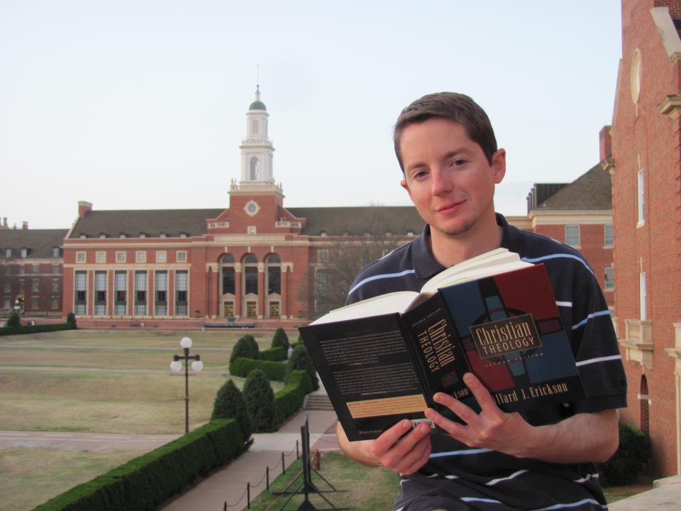 student with Christian book